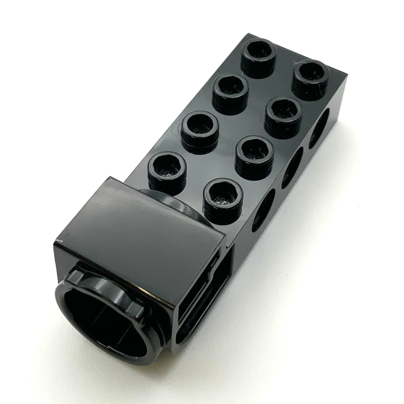 Technic, Brick Modified 2x4 with Pin Holes and Flywheel Socket, Part# 18585